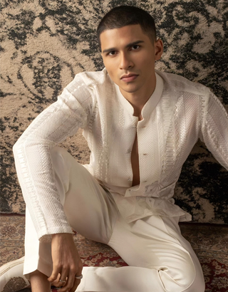 man in white kurta set