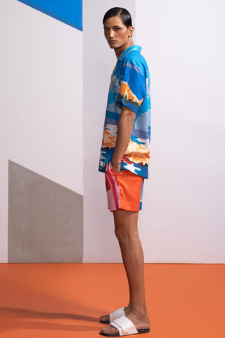 Blue beach house postcard polo shirt