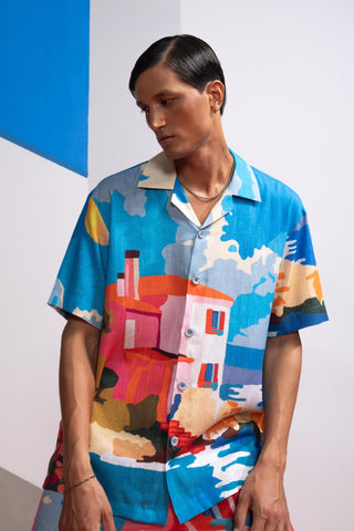 Blue beach house postcard polo shirt