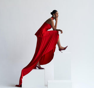 Orange halter jacket with draped reim skirt