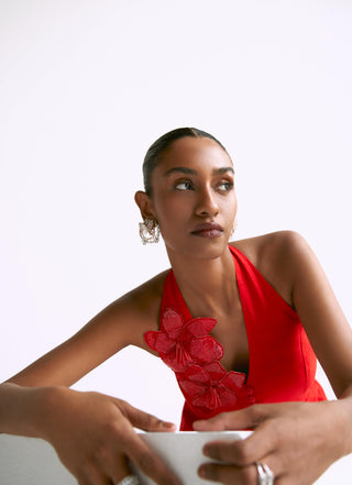 Orange halter jacket with draped reim skirt