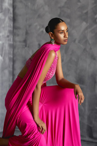 Pink fitted reim skirt with embellished blouse and dupatta