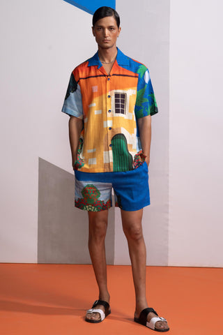 Blue house on the shore postcard polo shirt