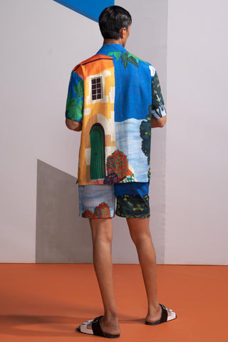 Blue house on the shore postcard polo co-ord set