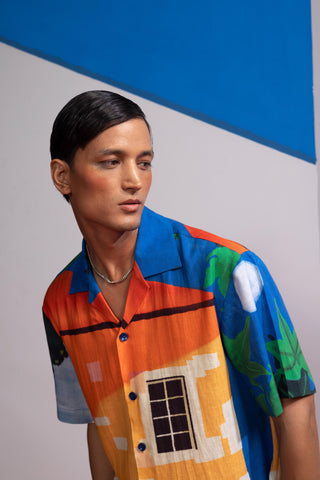 Blue house on the shore postcard polo co-ord set