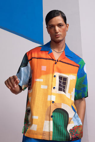 Blue house on the shore postcard polo co-ord set