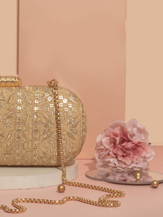 Gold mirai embroidered clutch
