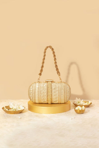 Gold naaz embroidered capsule clutch