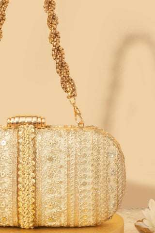 Gold naaz embroidered capsule clutch
