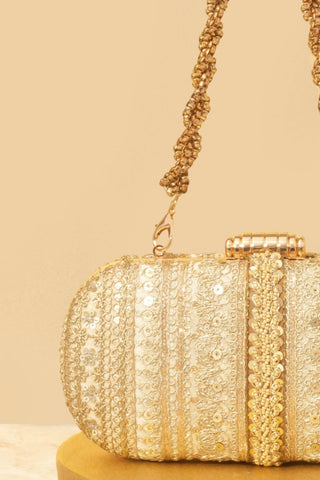 Gold naaz embroidered capsule clutch