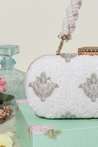 White nura capsule clutch