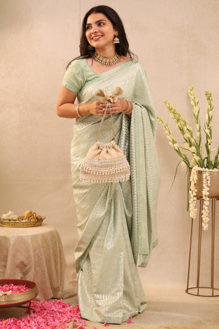 Ivory anahi embroidered brocade potli