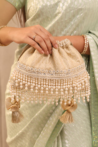 Ivory anahi embroidered brocade potli