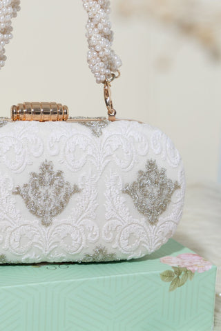 White nura capsule clutch