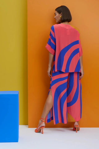 Blue and coral boxy top with slitted pants