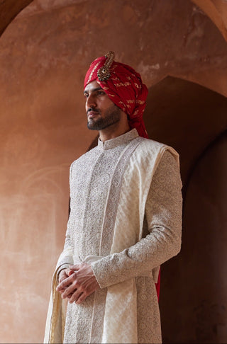Ivory tarana arabesque resham sherwani set by Nitika Gujral at Mrs. G