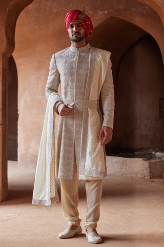 Ivory tarana arabesque resham sherwani set by Nitika Gujral at Mrs. G