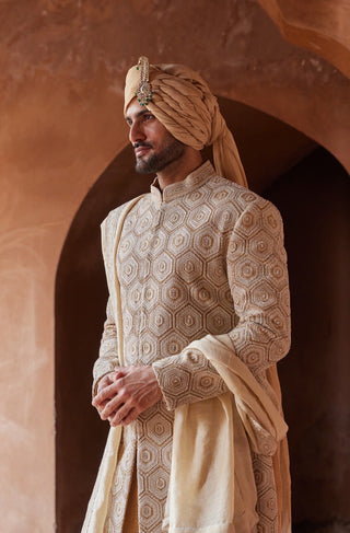 Yellow tarana geometric resham sherwani set by Nitika Gujral at Mrs. G