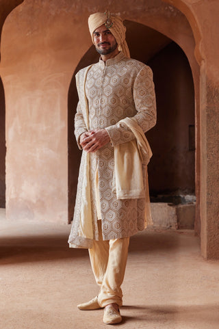 Yellow tarana geometric resham sherwani set by Nitika Gujral at Mrs. G