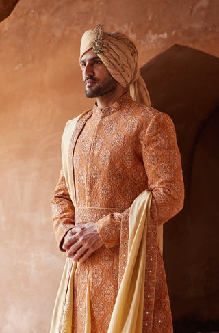 Orange tarana mirror work sherwani set by Nitika Gujral at Mrs. G