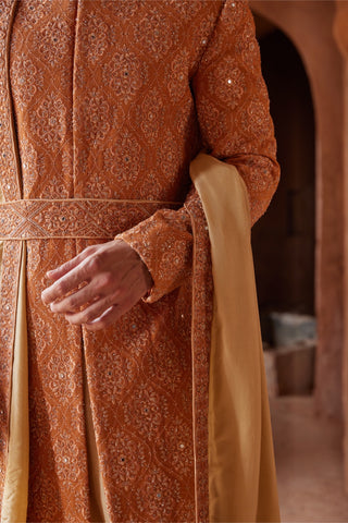 Orange tarana mirror work sherwani set by Nitika Gujral at Mrs. G
