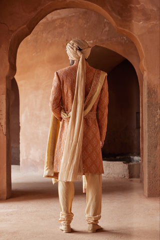 Orange tarana mirror work sherwani set by Nitika Gujral at Mrs. G