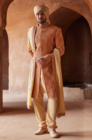 Orange tarana mirror work sherwani set by Nitika Gujral at Mrs. G