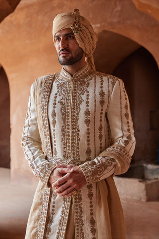 Ivory tarana antique zardozi sherwani set by Nitika Gujral at Mrs. G
