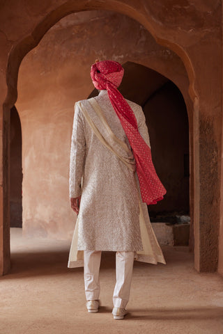 Ivory tarana rose gold pita sherwani set by Nitika Gujral at Mrs. G