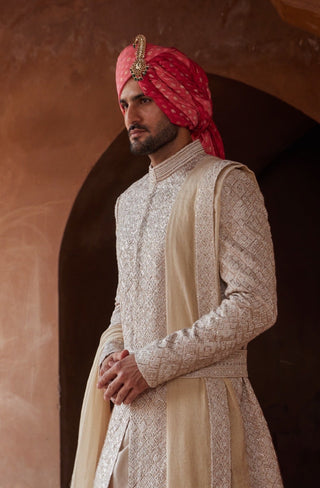 Ivory tarana rose gold pita sherwani set by Nitika Gujral at Mrs. G