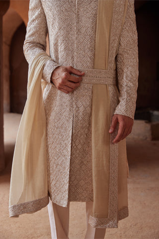 Ivory tarana rose gold pita sherwani set by Nitika Gujral at Mrs. G