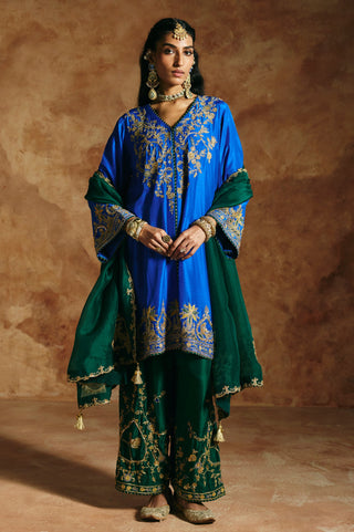 Front view of the cobalt blue kurta set with deep green pants and a green organza dupatta by Aman Takyar at Mrs. G
