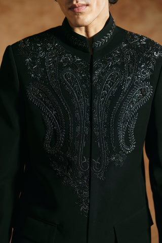 Close-up of the black bandhgala paisley panels in black thread and beadwork by Aman Takyar at Mrs. G