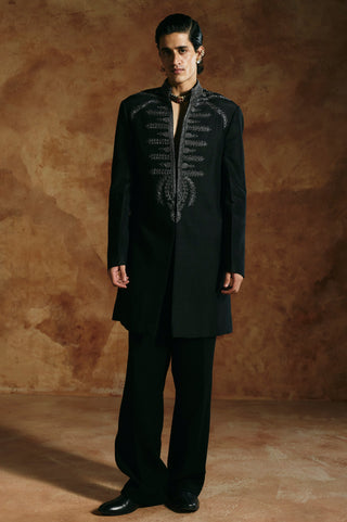 Front view of the black long jacket set with silver-gray zardozi down the center front by Aman Takyar at Mrs. G