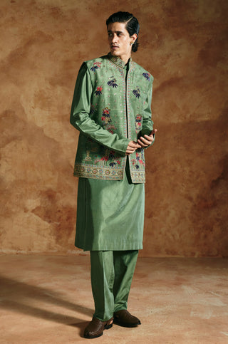 Side view of the green nehru jacket set with embroidery on the jacket front by Aman Takyar at Mrs. G