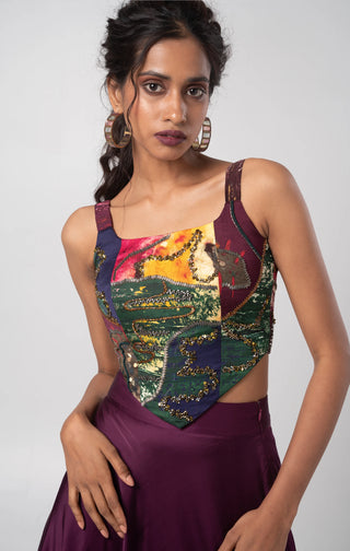 Deep purple hand embroidered corset with asymmetrical skirt