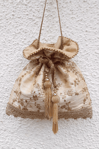 Beige alia silk embroidered potli bag