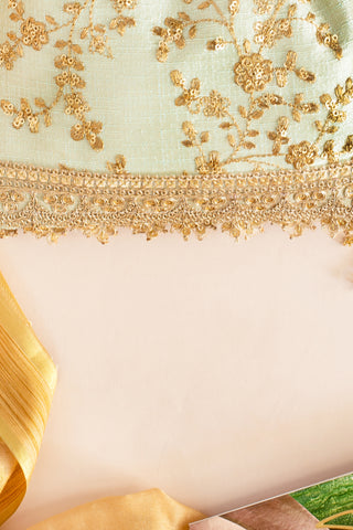 Green alia silk embroidered potli bag