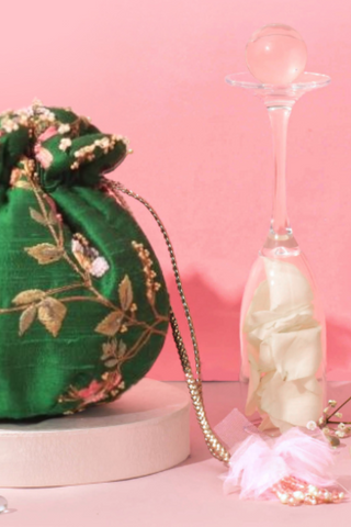 Green athena embroidered round potli