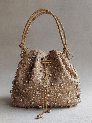 Gold sparkling bucket bag with dazzling crystals