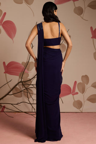 Blue blossom under bloom draped saree