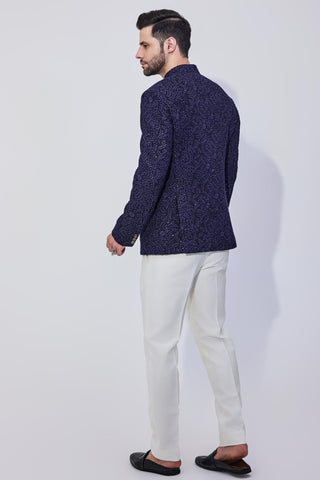 Blue bandhgala with offwhite pants