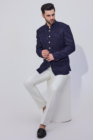 Blue bandhgala with offwhite pants