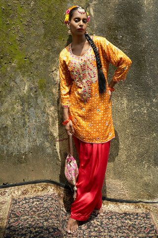 Mustard yellow bandhani silk features kurta set
