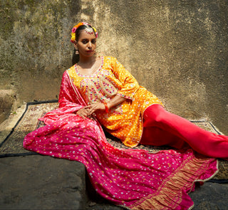 Mustard yellow bandhani silk features kurta set