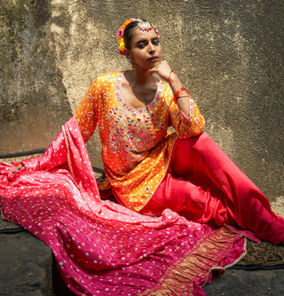 Mustard yellow bandhani silk features kurta set