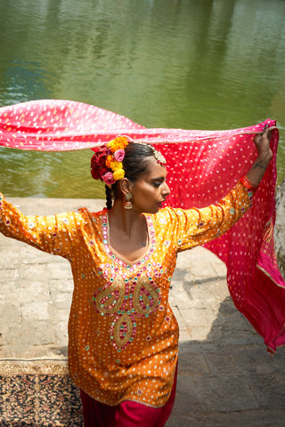 Mustard yellow bandhani silk features kurta set