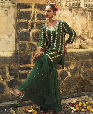 Emerald green silk features hand embroidered sharara set