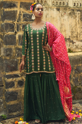 Emerald green silk features hand embroidered sharara set