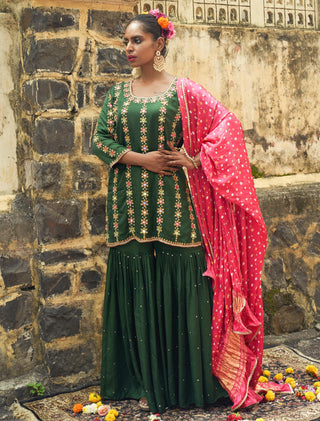 Emerald green silk features hand embroidered sharara set